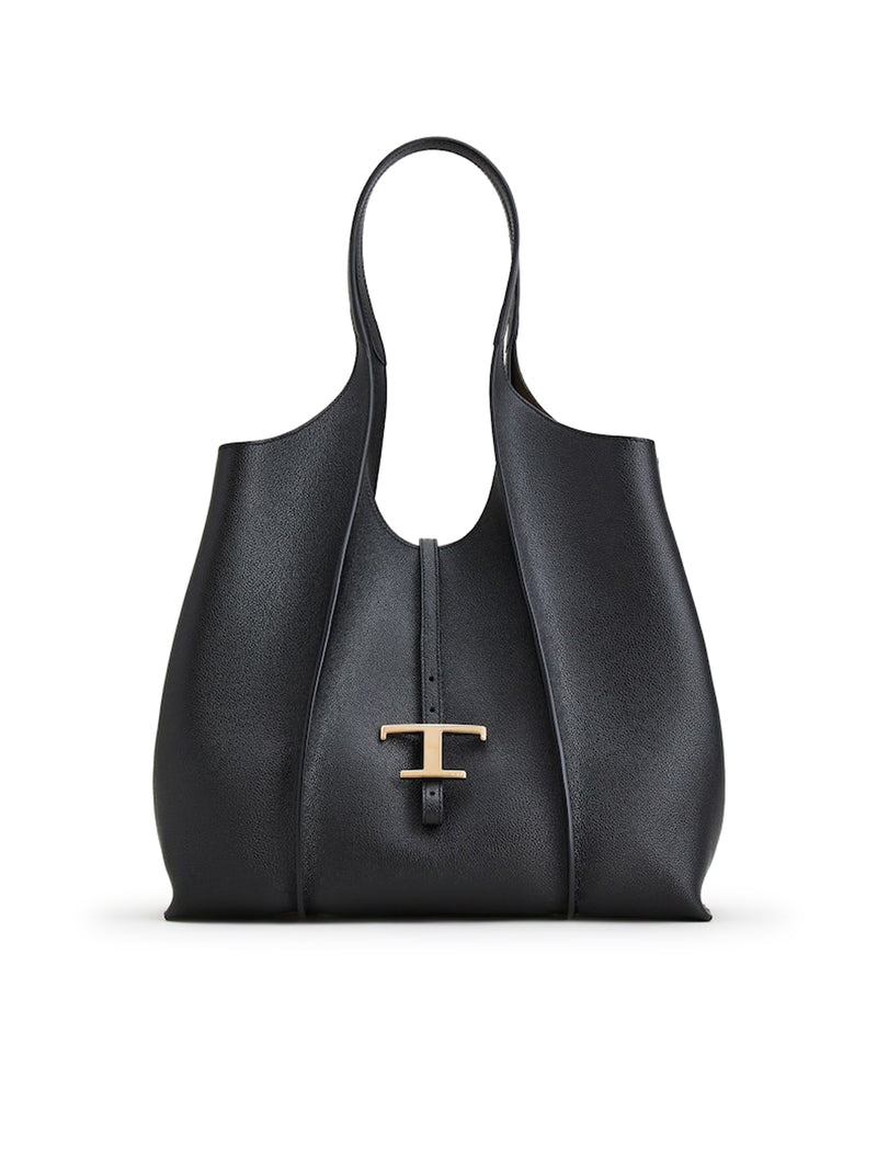 SHOPPING TIMELESS IN PELLE MEDIA