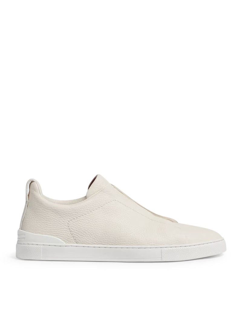 SNEAKER TRIPLE STITCH™ IN PELLE DI CERVO CREMA