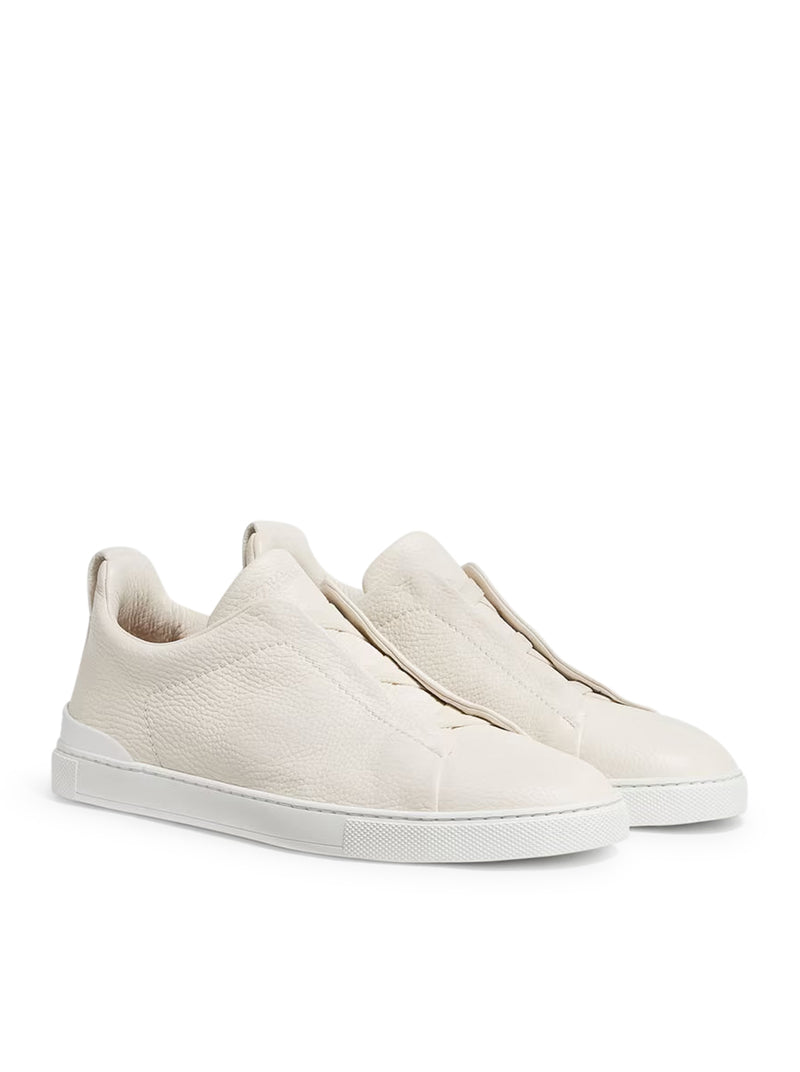 SNEAKER TRIPLE STITCH™ IN PELLE DI CERVO CREMA