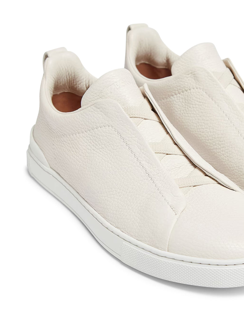 SNEAKER TRIPLE STITCH™ IN PELLE DI CERVO CREMA