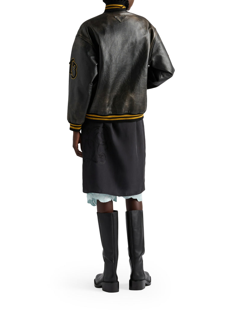 BOMBER IN PELLE CON PATCH