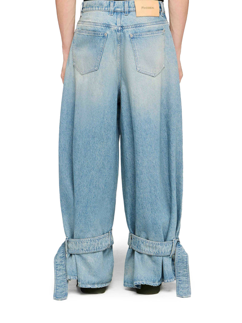 JEANS CON FIBBIA SULL`ORLO