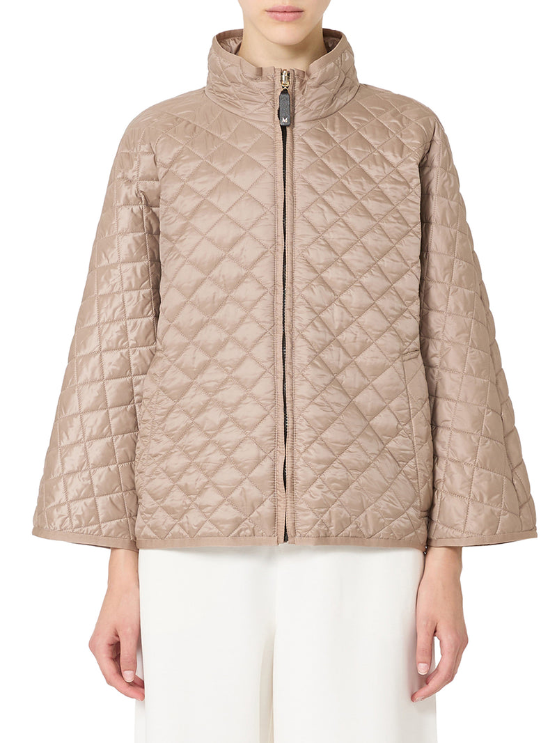 CAPPA REVERSIBILE IMBOTTITA IN TELA ANTIGOCCIA