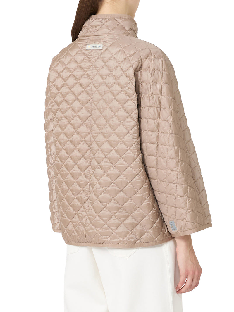 CAPPA REVERSIBILE IMBOTTITA IN TELA ANTIGOCCIA