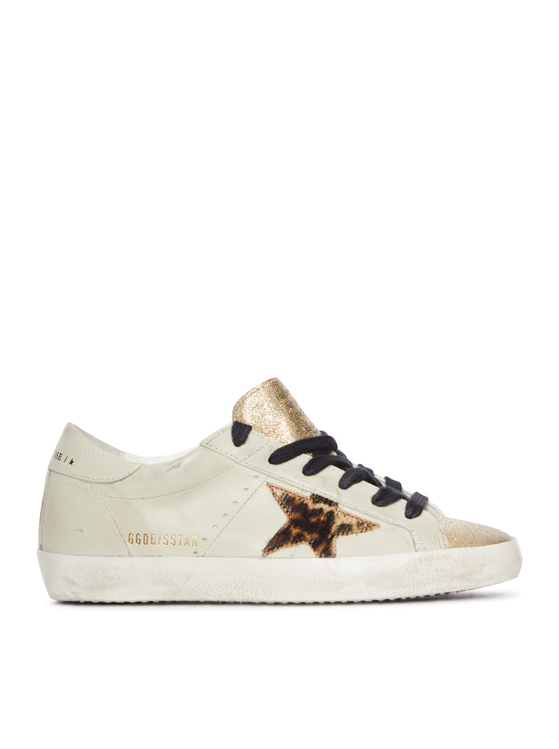 SNEAKER SUPERSTAR IN PELLE CON STELLA LEOPARDATA E LINGUETTA GLITTER
