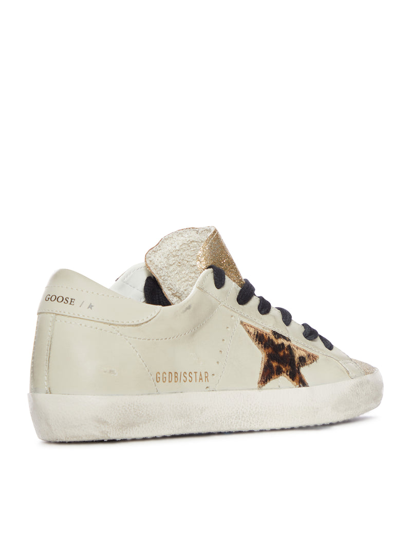 SNEAKER SUPERSTAR IN PELLE CON STELLA LEOPARDATA E LINGUETTA GLITTER