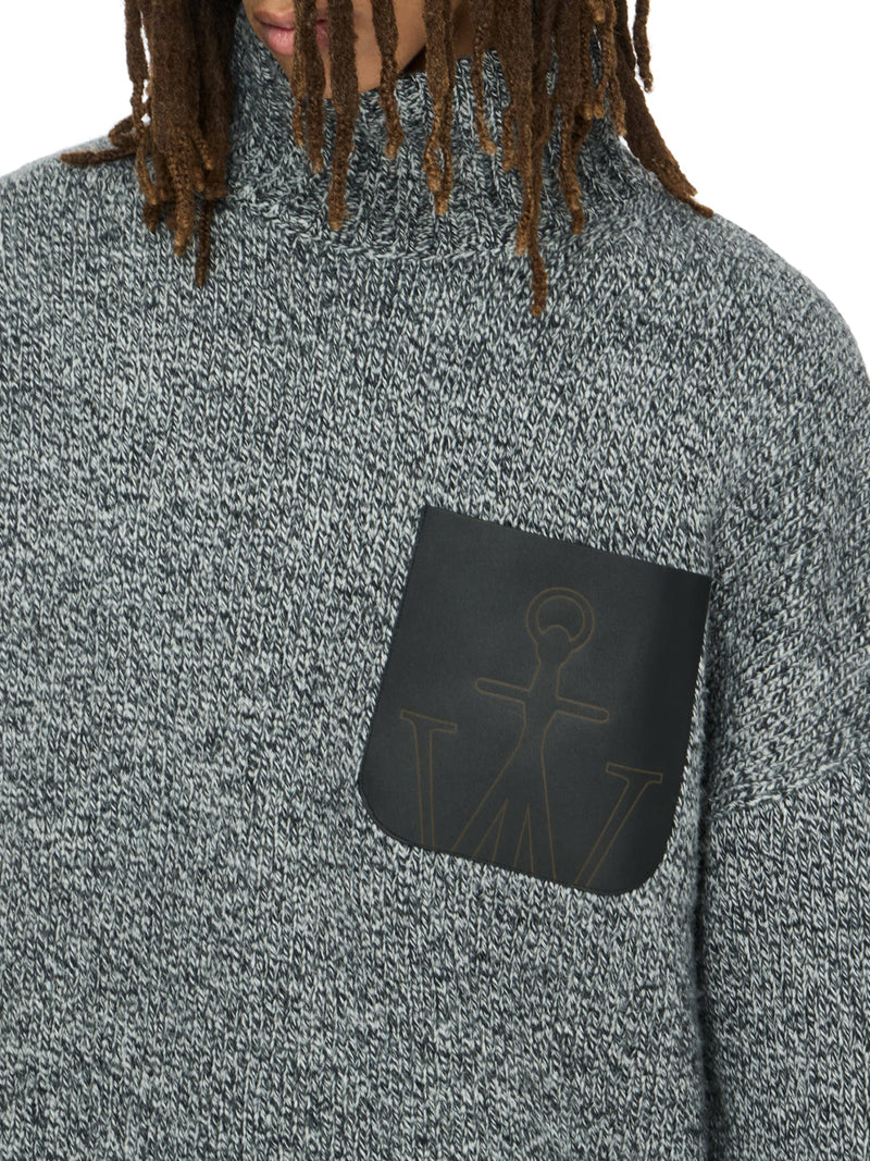 MAGLIONE CON TASCA IN PELLE