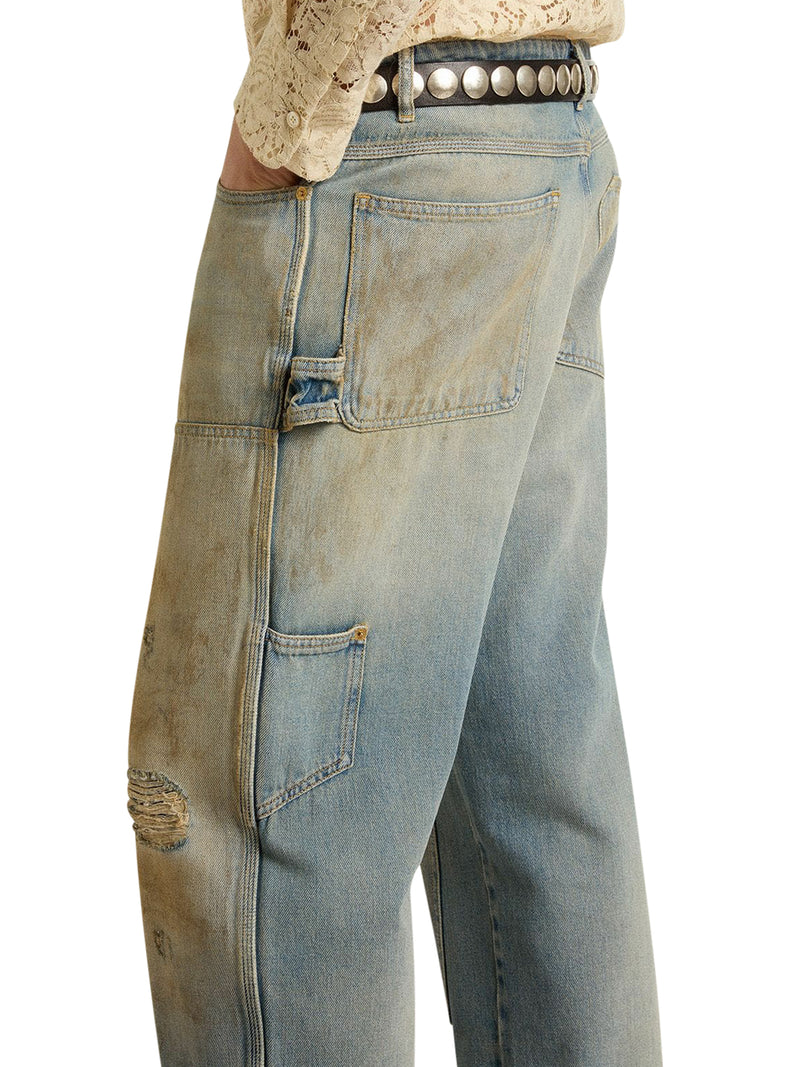 JEANS CON LAVAGGIO SABBIA DALL`EFFETTO DISTRESSED