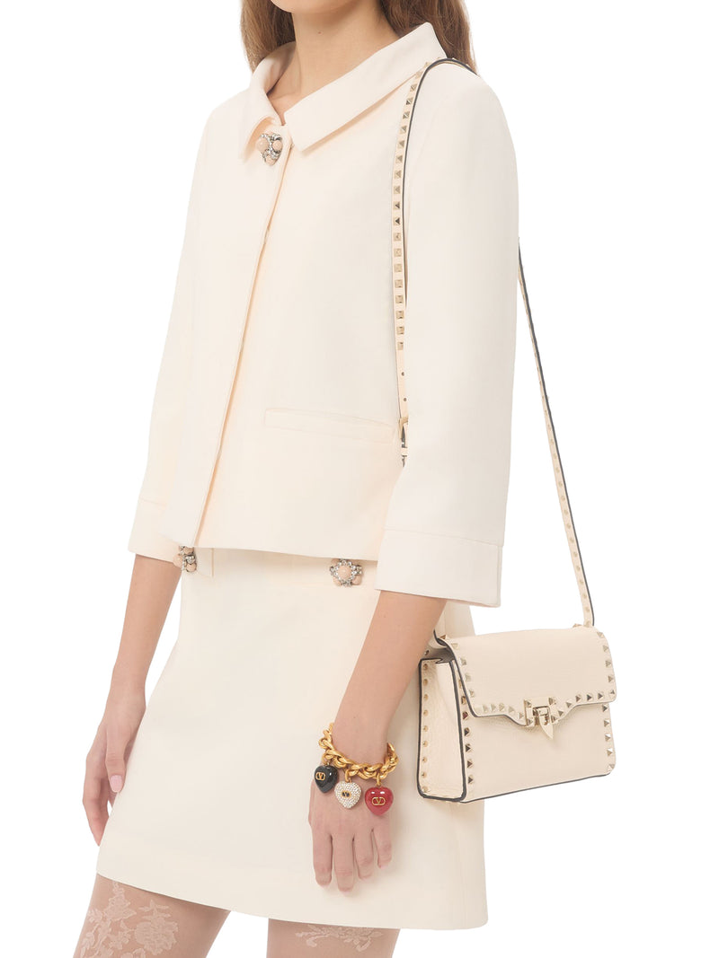 BORSA PICCOLA A TRACOLLA ROCKSTUD IN VITELLO GRANATO