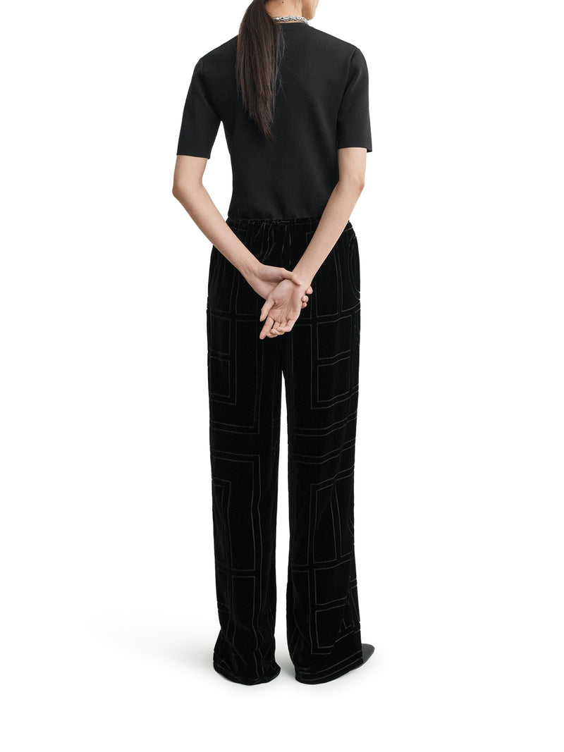 PANTALONI IN VELLUTO CON MONOGRAMMA DÉVORÉ