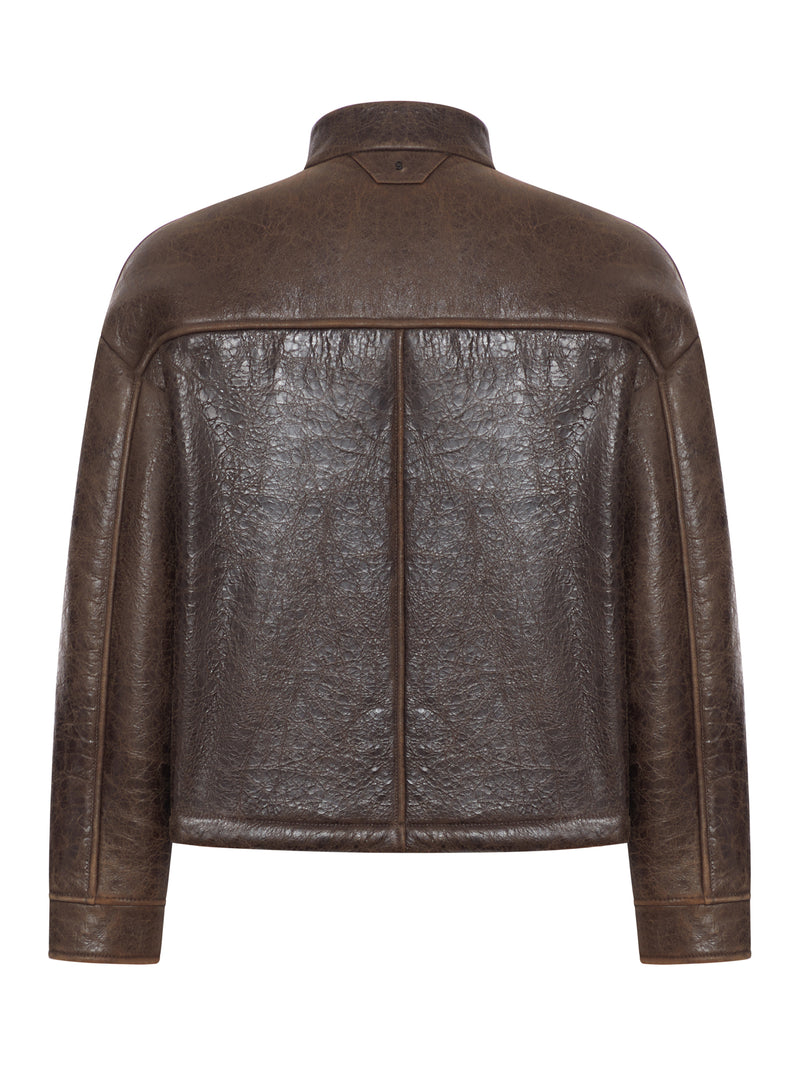 GIACCA IN PELLE CON TASCHE APPLICATE