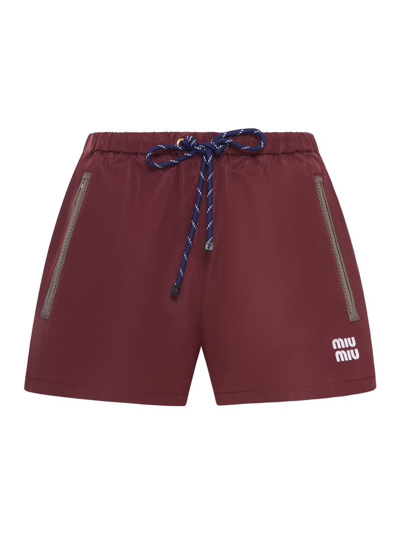 SHORTS IN TELA