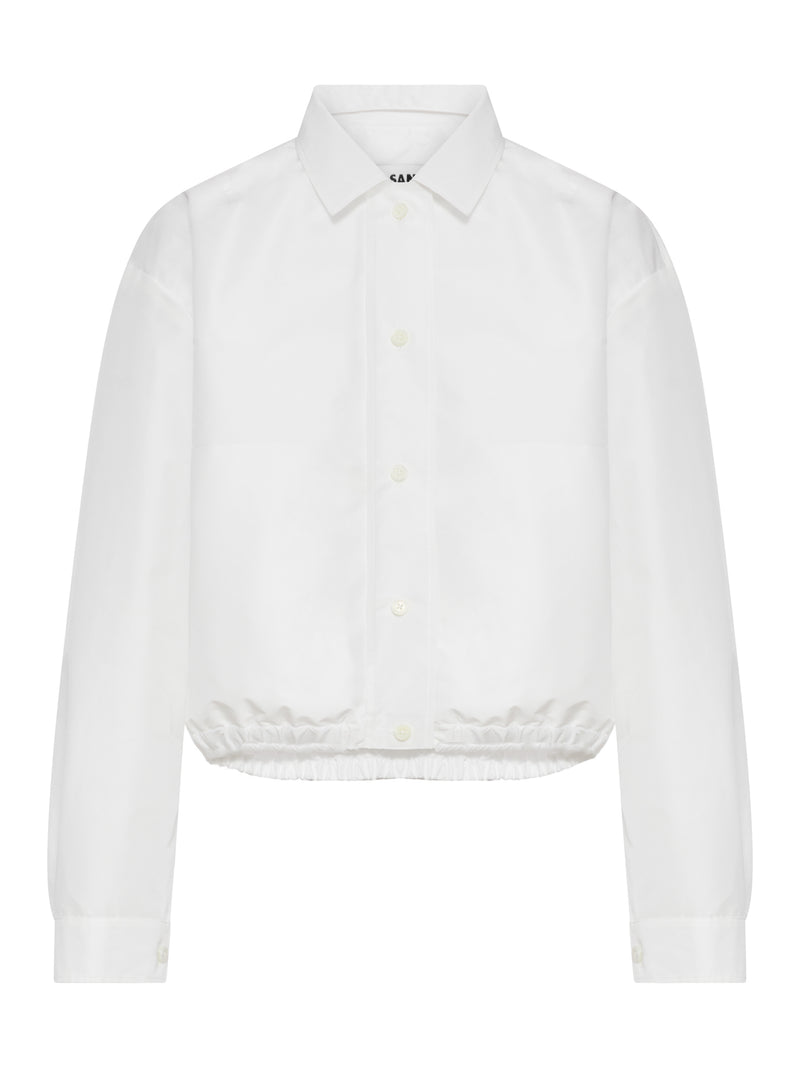 GIACCA CROPPED IN TESSUTO TECNICO CON ORLO ELASTICIZZATO