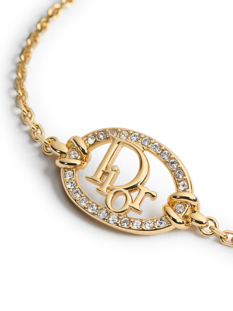 BRACCIALE OBLIQUE IN METALLO CON FINITURA ORO E CRISTALLI