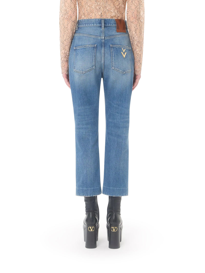 JEANS CROPPED A GAMBA SVASATA IN DENIM LAVAGGIO CHIARO
