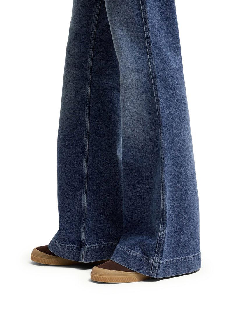 JEANS IN DENIM A GAMBA AMPIA