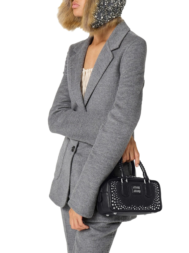 BORSA ARCADIE IN PELLE CON BORCHIE