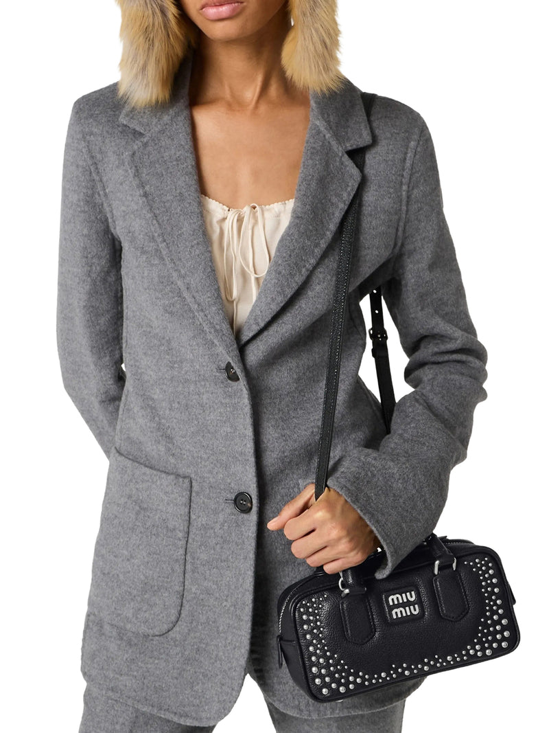 BORSA ARCADIE IN PELLE CON BORCHIE