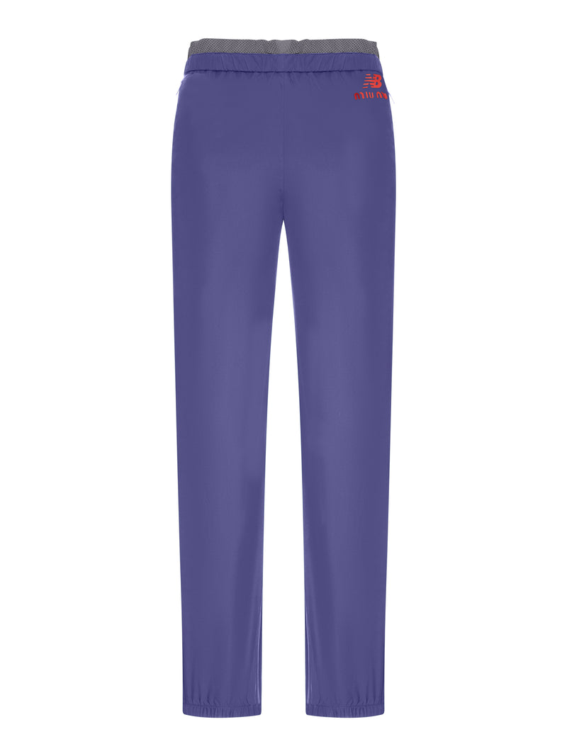 PANTALONI IN POPELINE TECNICO NEW BALANCE X MIU MIU CON COCO GAUFF