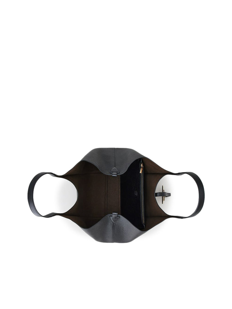 SHOPPING TIMELESS IN PELLE MEDIA