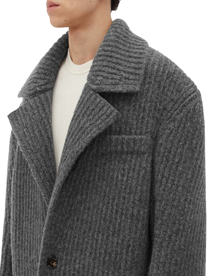 Cappotto in feltro di lana lavorato a maglia