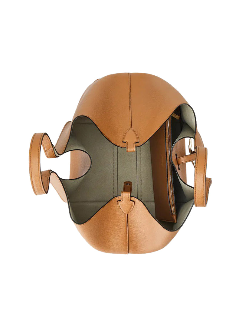 SHOPPING TIMELESS IN PELLE MEDIA