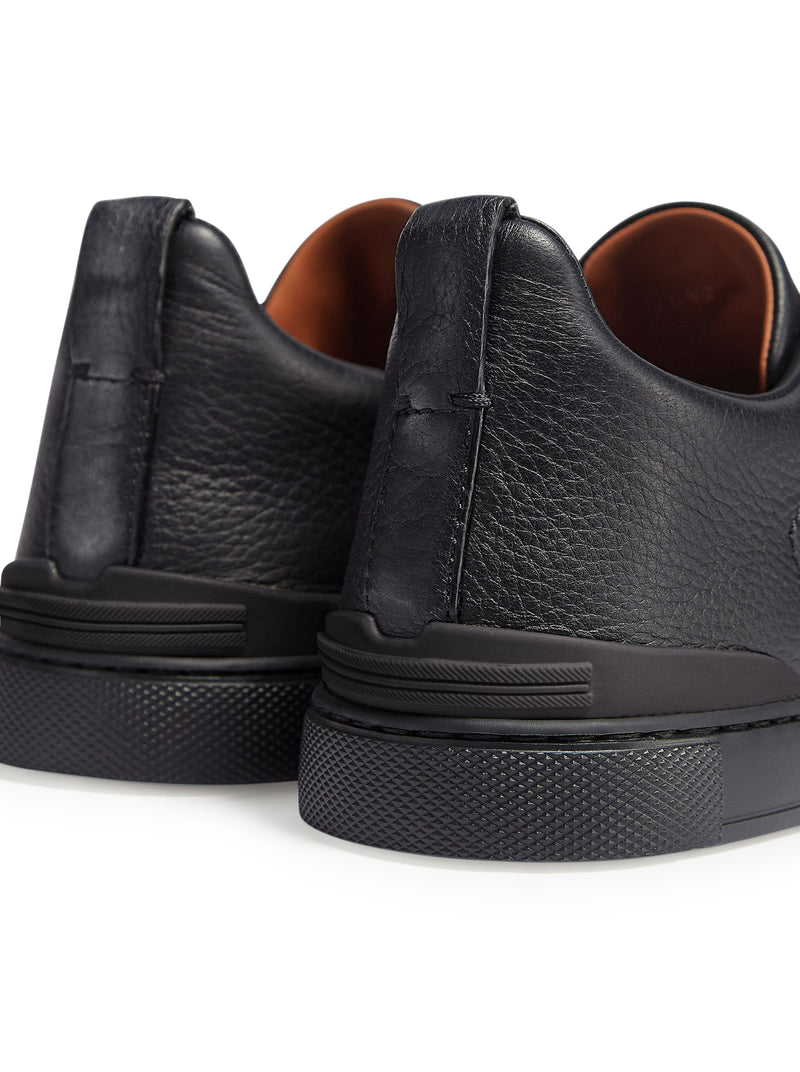 SNEAKER TRIPLE STITCH™ IN PELLE DI CERVO NERE