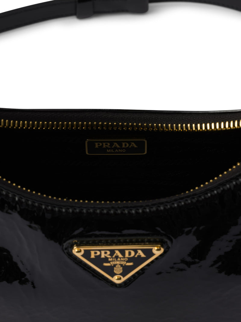 Prada Re-Edition mini bag in naplak patent leather