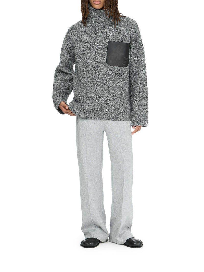 MAGLIONE CON TASCA IN PELLE