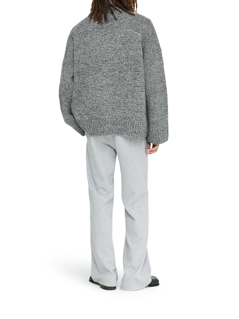 MAGLIONE CON TASCA IN PELLE