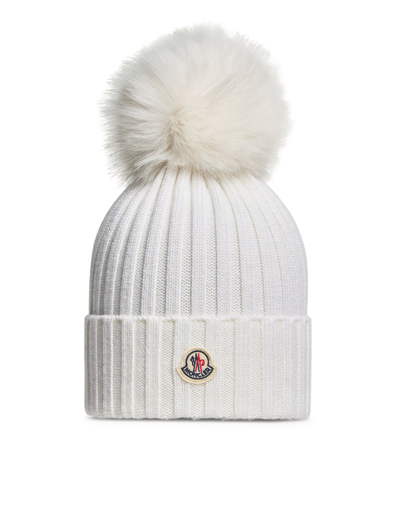 BERRETTO IN LANA CON POMPON