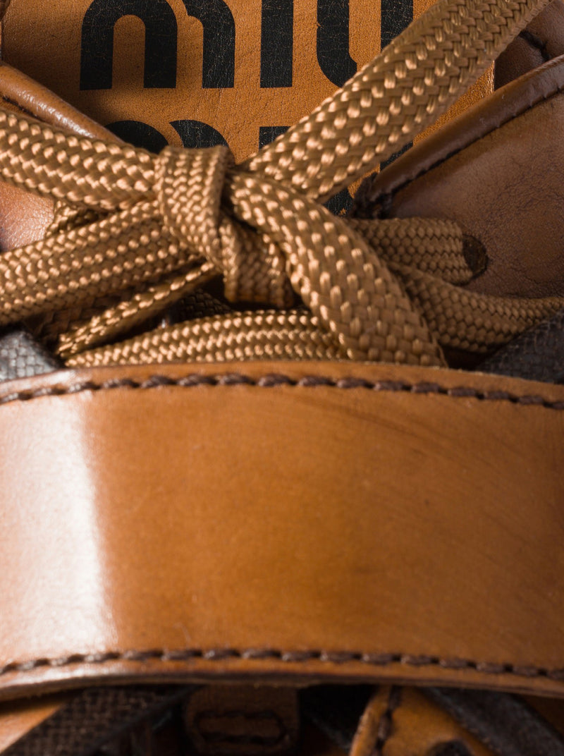 SNEAKERS IN PELLE CON FIBBIA