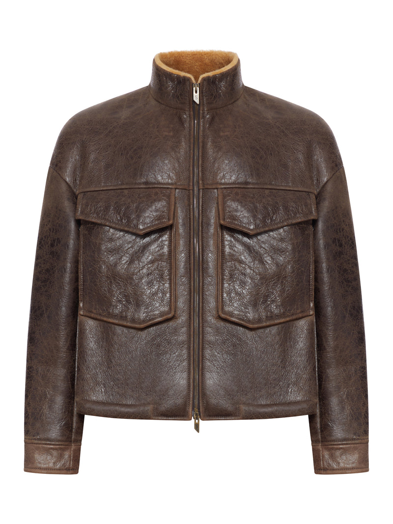 GIACCA IN PELLE CON TASCHE APPLICATE