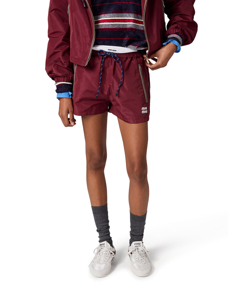 SHORTS IN TELA
