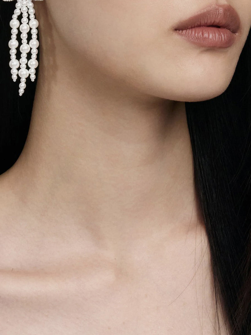 ORECCHINI A CASCATA CON FIOCCO DI PERLE