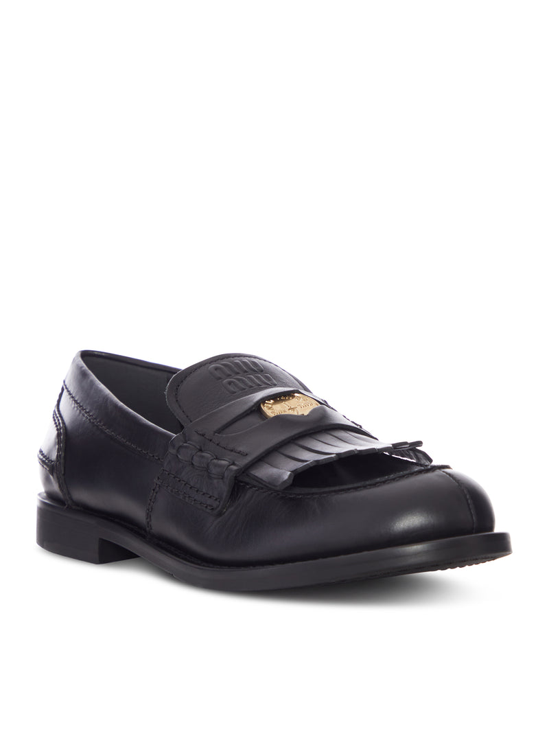MOCASSINO IN PELLE CON FRANGE E DETTAGLIO LOGO