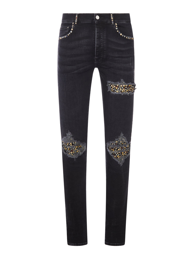 JEANS SKINNY CON BORCHIE E DETTAGLI DESTROY