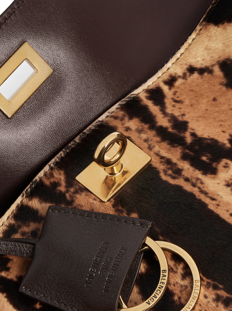 BORSA A MANO RODEO PICCOLA IN PELLE CON STAMPA LEOPARDATA