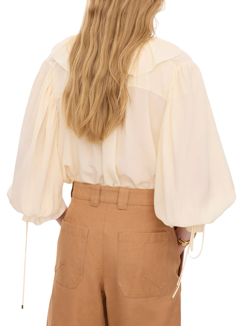 TOP CON VOLANT E SCOLLO A V IN CREPE DE CHINE