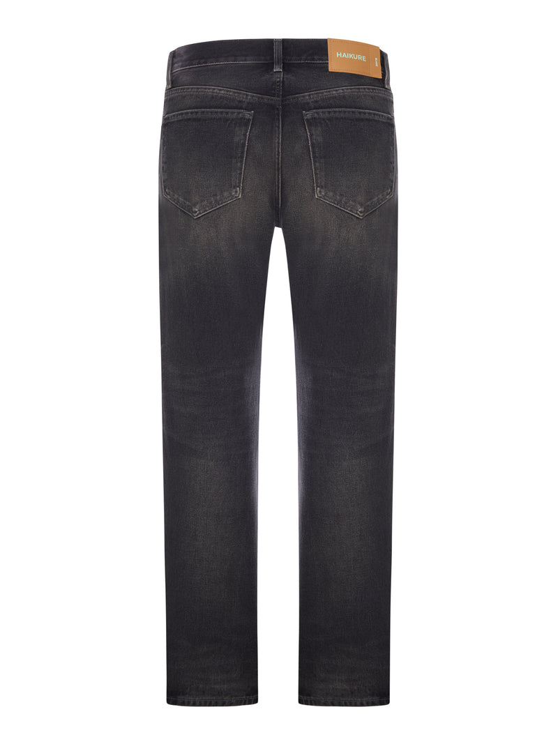 JEANS DRITTO IN DENIM LAVATO CON TASCHE