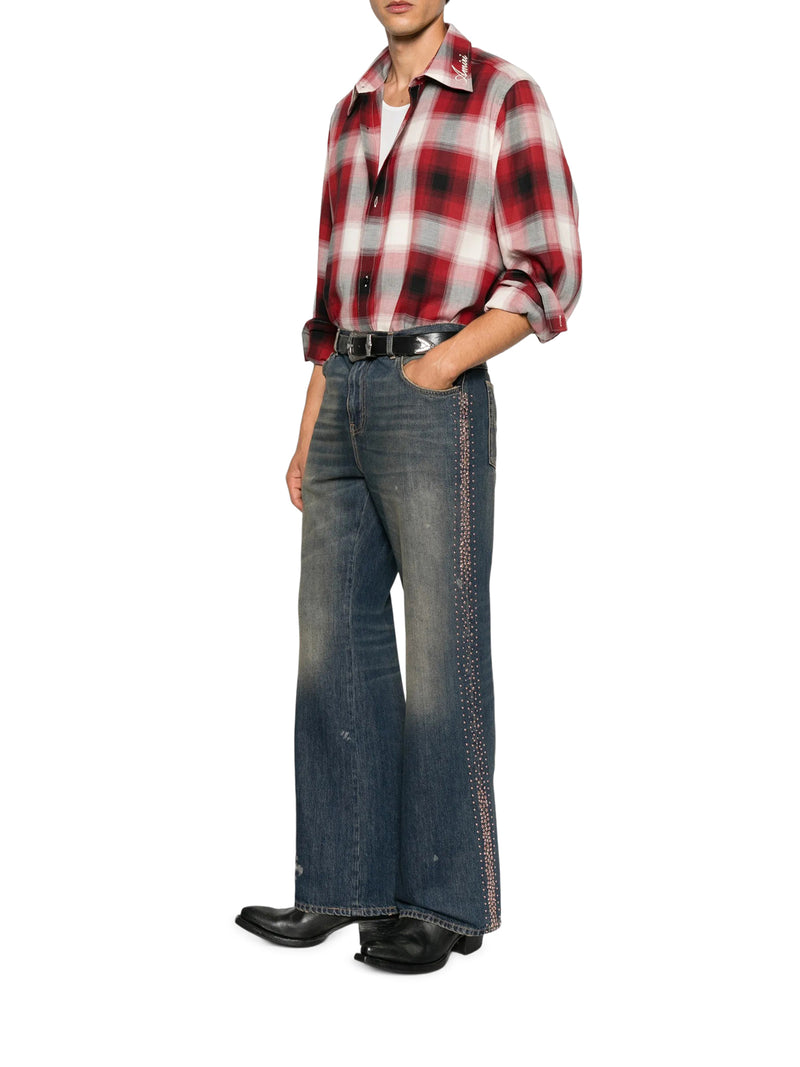 JEANS EFFETTO VINTAGE CON BORCHIE STUDS APPLICATE