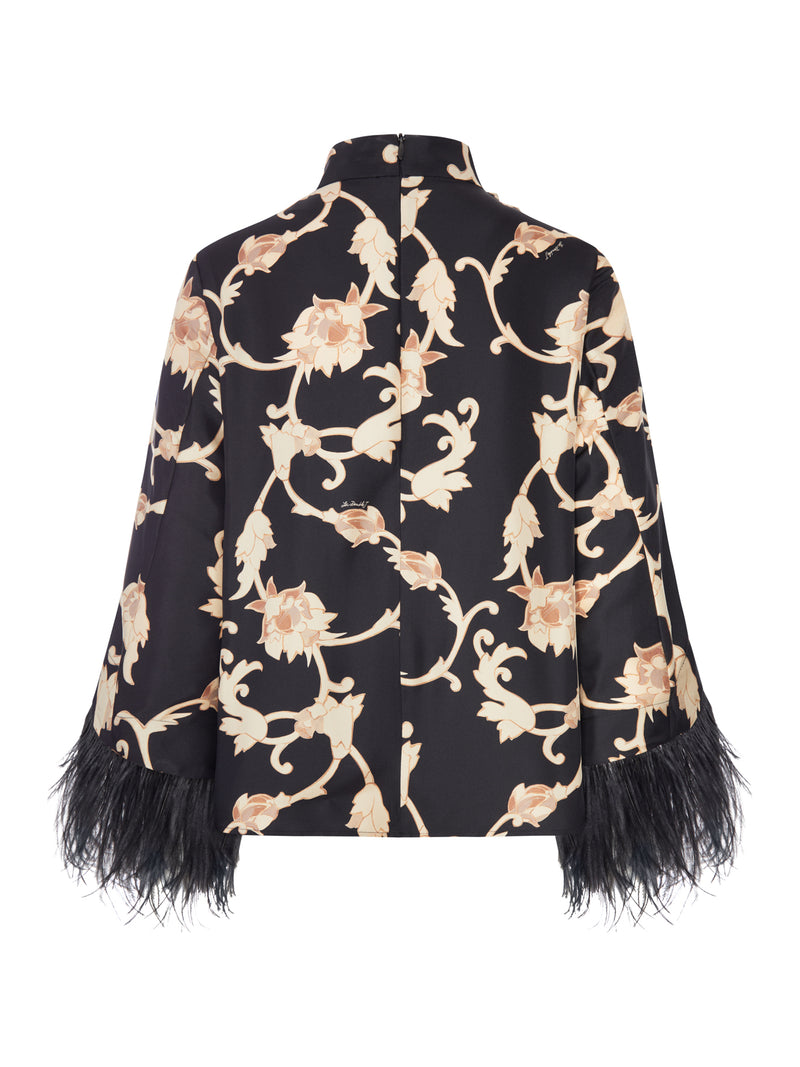 BLUSA STAMPATA CON COLLO ALTO E POLSINI IN PIUME
