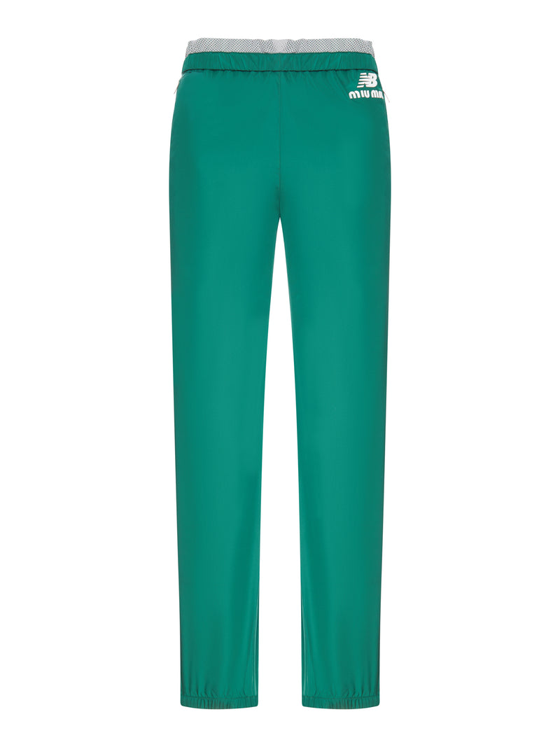 PANTALONI IN POPELINE TECNICO NEW BALANCE X MIU MIU CON COCO GAUFF