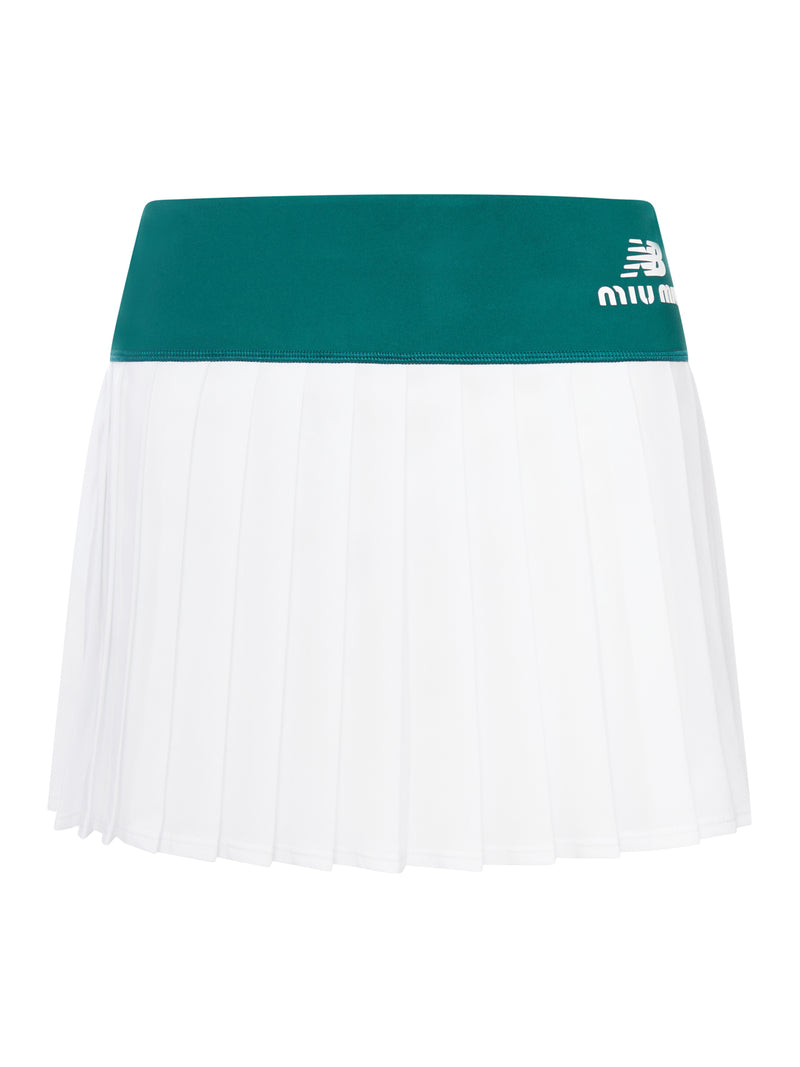 GONNA TENNIS PLISSÉ NEW BALANCE X MIU MIU CON COCO GAUFF