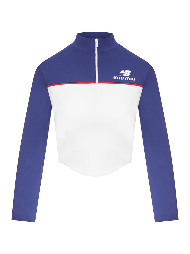TOP IN JERSEY TECNICO NEW BALANCE X MIU MIU CON COCO GAUFF