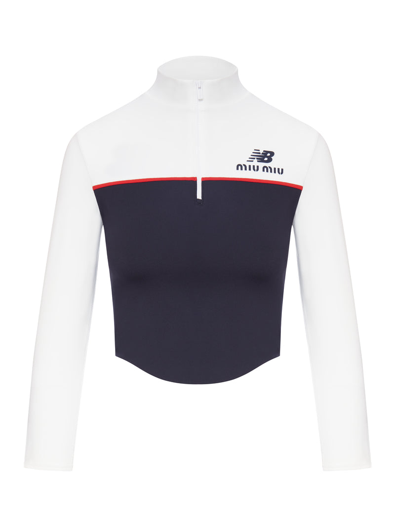 TOP IN JERSEY TECNICO NEW BALANCE X MIU MIU CON COCO GAUFF