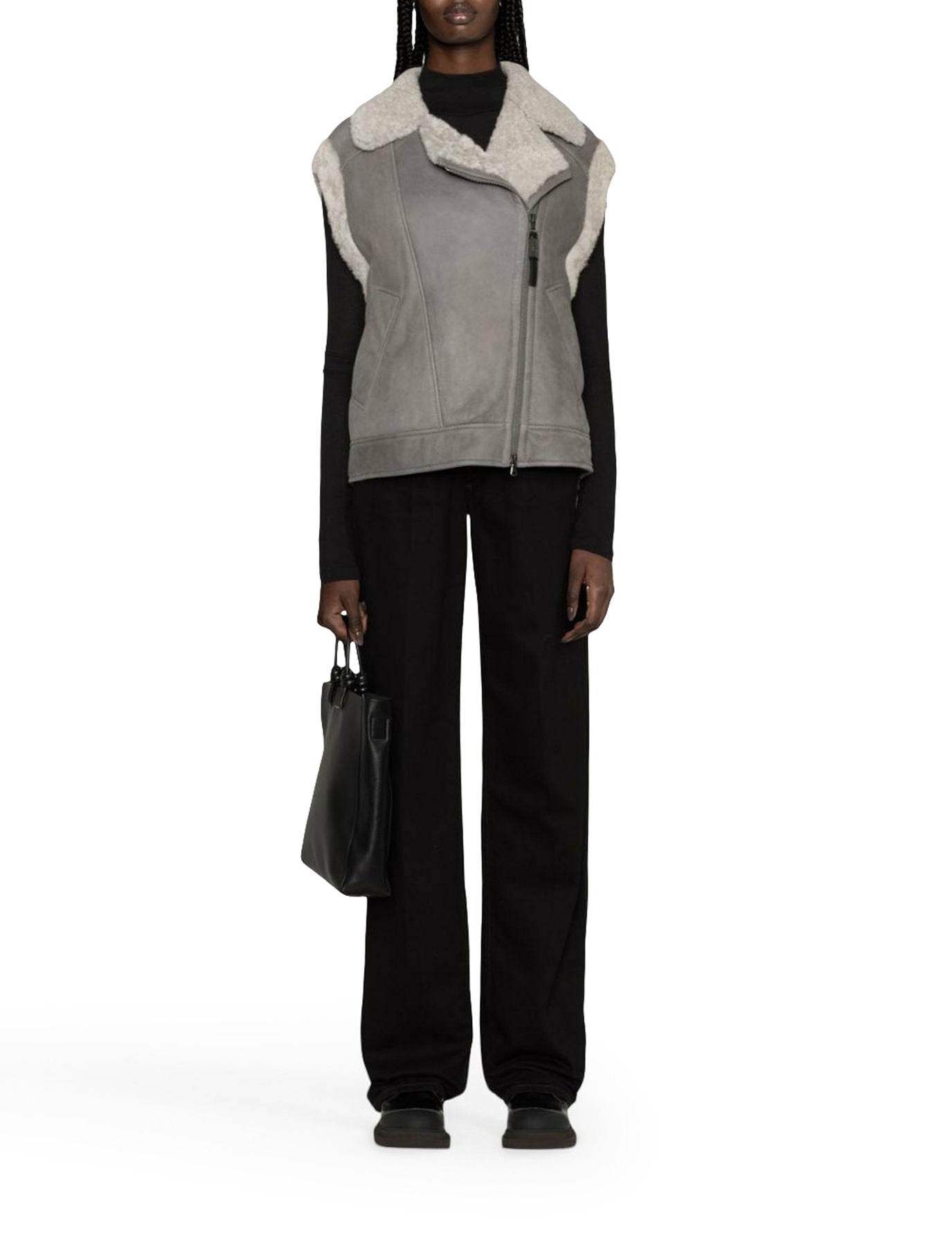 gilet con zip e finiture in shearling